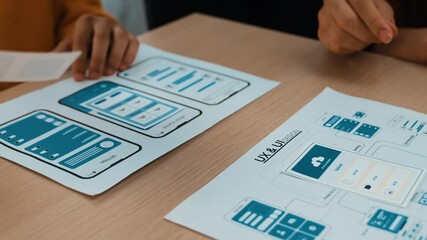 Poster - panorama video of startup company employee planning on user interface prototype for mobile applicati
