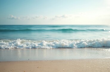 Aufkleber - Tranquil beach scene with gentle waves. Clear turquoise water meets sandy shore. Soft sunlight illuminates horizon. Calm sea, relaxation, zen, peaceful serene summer tropical vacation holiday mood.