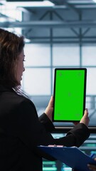 Poster - vertical video computer scientists in data center use mockup tablet, inspecting server rigs, updatin