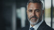 © Mykhailo Shvets - Confident Caucasian Male Entrepreneur in a Stylish Suit Smiling in a Modern Business Environment, Representing Leadership, Success, and Professionalism