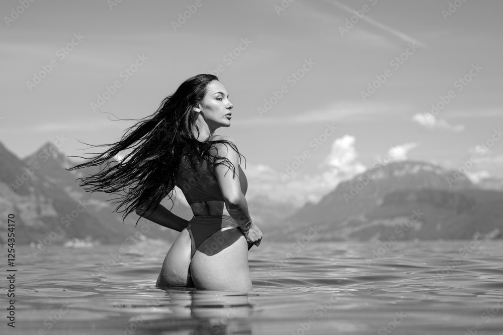 Back and buttocks of sexy model in bikini during summer
