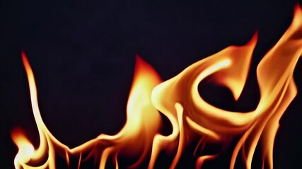 Poster - Flames dancing against a dark background, dynamic motion and artistic fluidity concept