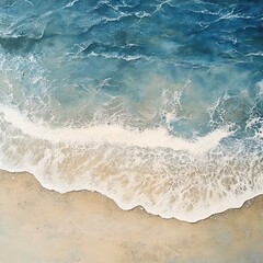 Poster - Aerial view of ocean waves washing onto sandy beach creating a serene and calming seascape