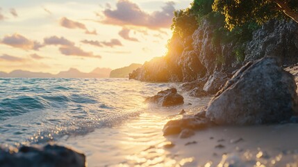 Poster - Tropical beach at golden sunset with rocky coastline and calm ocean water creating serene mood