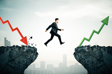 Canvas Print - Businessman jumping from financial decline to success.