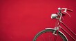 © Alexandr - Vintage bicycle against a vibrant red wall, showcasing classic design
