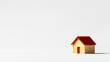 © julio - Miniature Wooden House With Red Roof On White Background