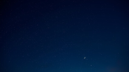 Wall Mural - moon with starry milky way background.