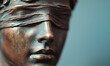 Exploring the Depth of Emotion Through a Stunning Bronze Sculpture of a Blindfolded Figure, Symbolizing Truth and Justice in Artistic Expression