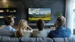 © adha - Family enjoying nature documentary on TV together in comfortable living room