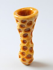 Poster - Abstract honey colored vase with organic holes design on a white background studio shot