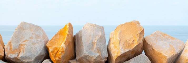 Aufkleber - Coastal Minimalism Golden Rock Formation Against Ocean Backdrop for Sustainable Design and Eco-Friendly Commercial Marketing Initiatives
