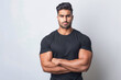 © Shivani - young indian handsome man wearing black t shirt on white background