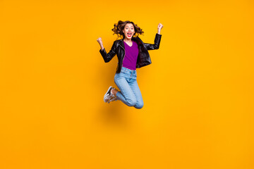 Wall Mural - full body photo of cheerful cute girl raise her fists scream yeah jump celebrate achievement wear de