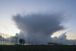 © Westend61 - Large storm cloud over agricultural field