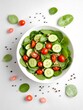 © MD NAZMUL - Salad with Cherry Tomatoes and Cucumber in a White Bowl