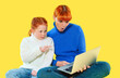 © Iryna - Excitement of discovery as mother and daughter explore together on a laptop