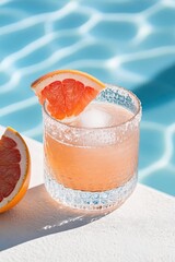 Wall Mural - Refreshing cocktail garnished with grapefruit slice, surrounded