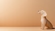 © Artyom - Minimalist paper-crafted dog on beige background