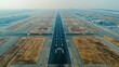 Tarmac airport runway, Aerial view of large airport runway with surrounding taxiways and terminals.