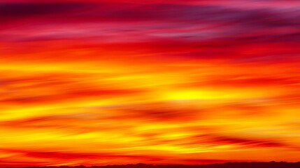 Wall Mural - vibrant sunset with swirling cloud over a tranquil landscape, evoking serenity and beauty