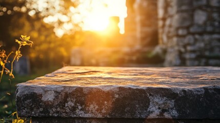 Golden hour light illuminates an aged stone surface with natural weathered textures beautifully