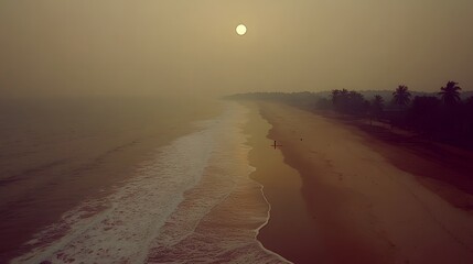 Wall Mural - serene beach at sunset with vibrant sky and gentle waves lapping against the shore