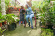 © Caia Image - Disabled women working at plant nursery