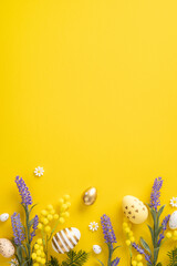 Wall Mural - vibrant vertical yellow background featuring decorative easter eggs surrounded by spring flowers and