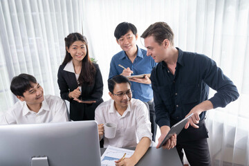 Wall Mural - Group of diverse office worker employee working together on strategic business marketing planning in corporate office room. Positive teamwork in business workplace concept. Prudent