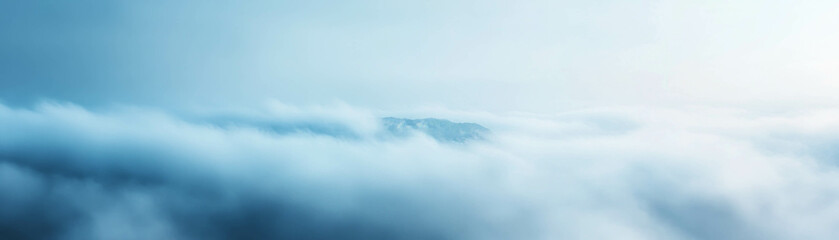  - Blurred landscape seen through fog creates a serene and dreamy atmosphere