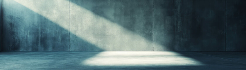 Poster - Empty room featuring a solitary spotlight creating a dramatic atmosphere on the concrete floor