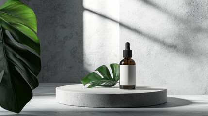 Aufkleber - A chic serum bottle sits gracefully on a round stone pedestal, bathed in soft natural light. Nearby, a vibrant green leaf adds a touch of nature, creating a tranquil atmosphere