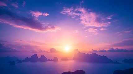 Wall Mural - sunset over the sea with vibrant orange and purple hues in the twilight sky reflecting on the water