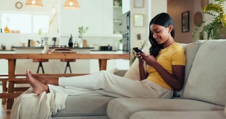 Aufkleber - Texting, phone or Indian woman in home to relax on social media for rest or comfort on weekend on couch. Chilling, technology or female person with mobile on sofa for choice and online dating app