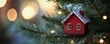 © Влада Яковенко - Festive red house ornament on christmas tree with twinkling lights