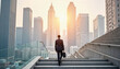 © Prachii1778 - Businessman walking on ladder to success on beautiful landscape and sky background Leadership and success concept