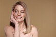 © New Africa - Portrait of beautiful happy woman with straight blonde hair and stylish makeup on dark beige background, space for text