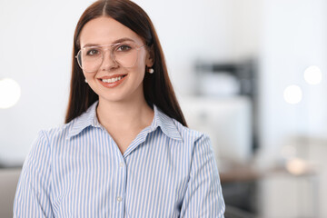 Wall Mural - Portrait of banker in office, space for text