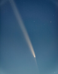 Wall Mural - Comet 2023 A3 Tsuchinshan ATLAS
Interstellar comet. A comet with a long tail crossing space. Comet stars and night sky blue sky with stars