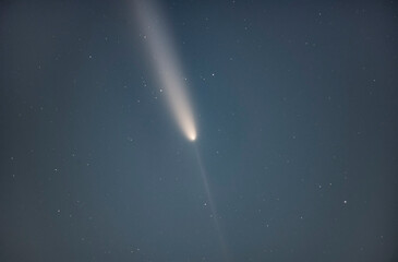 Wall Mural - Comet 2023 A3 Tsuchinshan ATLAS
Interstellar comet. A comet with a long tail crossing space. Comet stars and night sky blue space background