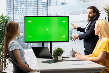 Financial adviser conducting audit of clients income, doing presentation on isolated screen to help them build saving habits. Consultant using large mockup display to show investing tips