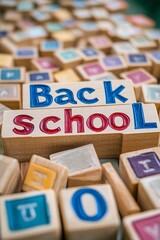 Poster - Back to school concept with colorful letters on wooden cubes