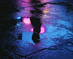 Wall Mural - Neon reflections in a puddle. AI.