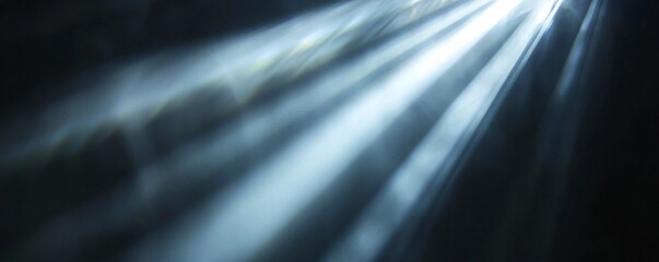 Poster - Abstract background featuring blurry blue and white light rays shining through darkness