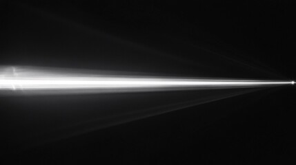 Poster - Brilliant white light beam illuminates a dark backdrop