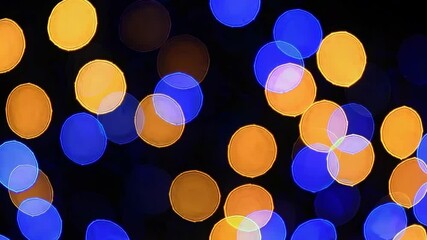 Poster - Colorful bokeh lights in blue and orange, abstract festive background. Vibrant visual effect concept