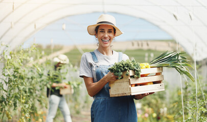 Wall Mural - Woman, smile and basket for harvest in greenhouse, farming and growth with sustainability in summer. Person, happy and portrait with food production, agriculture or nursery for vegetables in Portugal