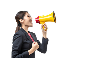 Portrait of smiling Asian woman wearing black suit shouting in megaphone isolated over white background. Making announcement, studio shot, side view