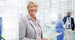 © peopleimages.com - Portrait, mature or happy woman with documents at hospital for medical funding, campaign or development. Female person, board director or health manager with smile or paperwork for healthcare program